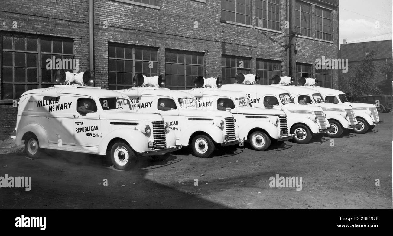 Roosevelt's 1940 Presidential campaign. Here's a fleet of loudspeaker trucks that drove through towns and neighborhoods blaring campaign info in favor of President Roosevelt's opponent, businessman Wendell Willkie, the Republican Party's candidate, who had never run for a political office before. Willkie's VP running mate was Charles McNary. The trucks all had 4-way speakers. The first 3 are new GMC Chevrolet panel trucks with Illinois license plates. Others are International Harvester panel trucks with no visible plates. To see my transportation-related photos Search: Prestor vintage vehicle Stock Photo