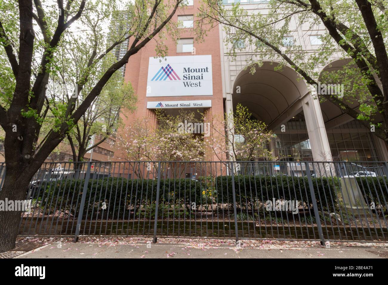 an entrance to the Mount Sinai West hospital in midtown west Manhattan in early Spring. Formerly Roosevelt Hospital, it merged with Mt. Sinai in 2013. Stock Photo