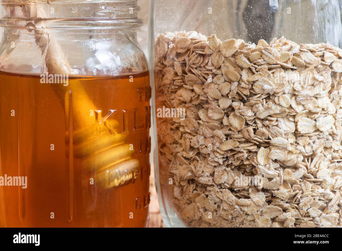 Honey and oats in kilner jars Stock Photo Alamy