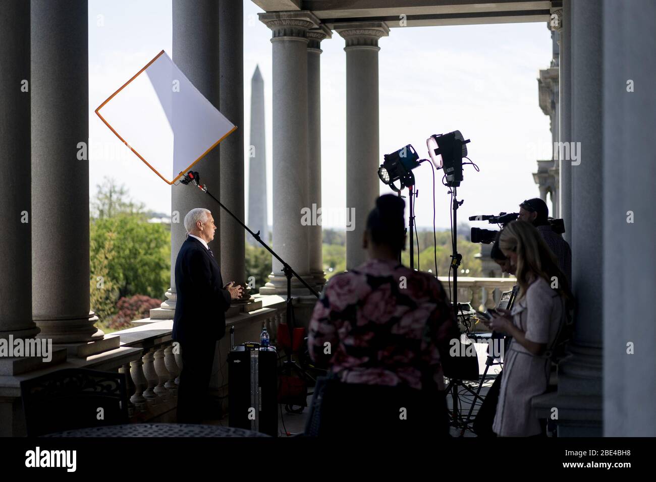 Washington, United States Of America. 08th Apr, 2020. Vice President Mike Pence participates in a taped interview with Sean Hannity of Fox News on the balcony of the Vice PresidentÕs Ceremonial Office Wednesday, April 8, 2020, in the Eisenhower Executive Office Building of the White House People: Vice President Mike Pence Credit: Storms Media Group/Alamy Live News Stock Photo
