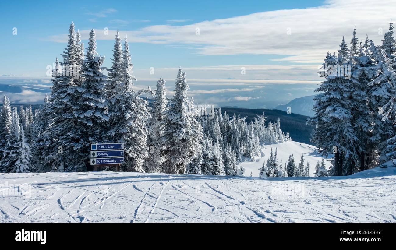 Sign for three ski runs at Sun Peaks Resort in the Rocky Mountains;  Sun Peaks, British Columbia, Canada Stock Photo