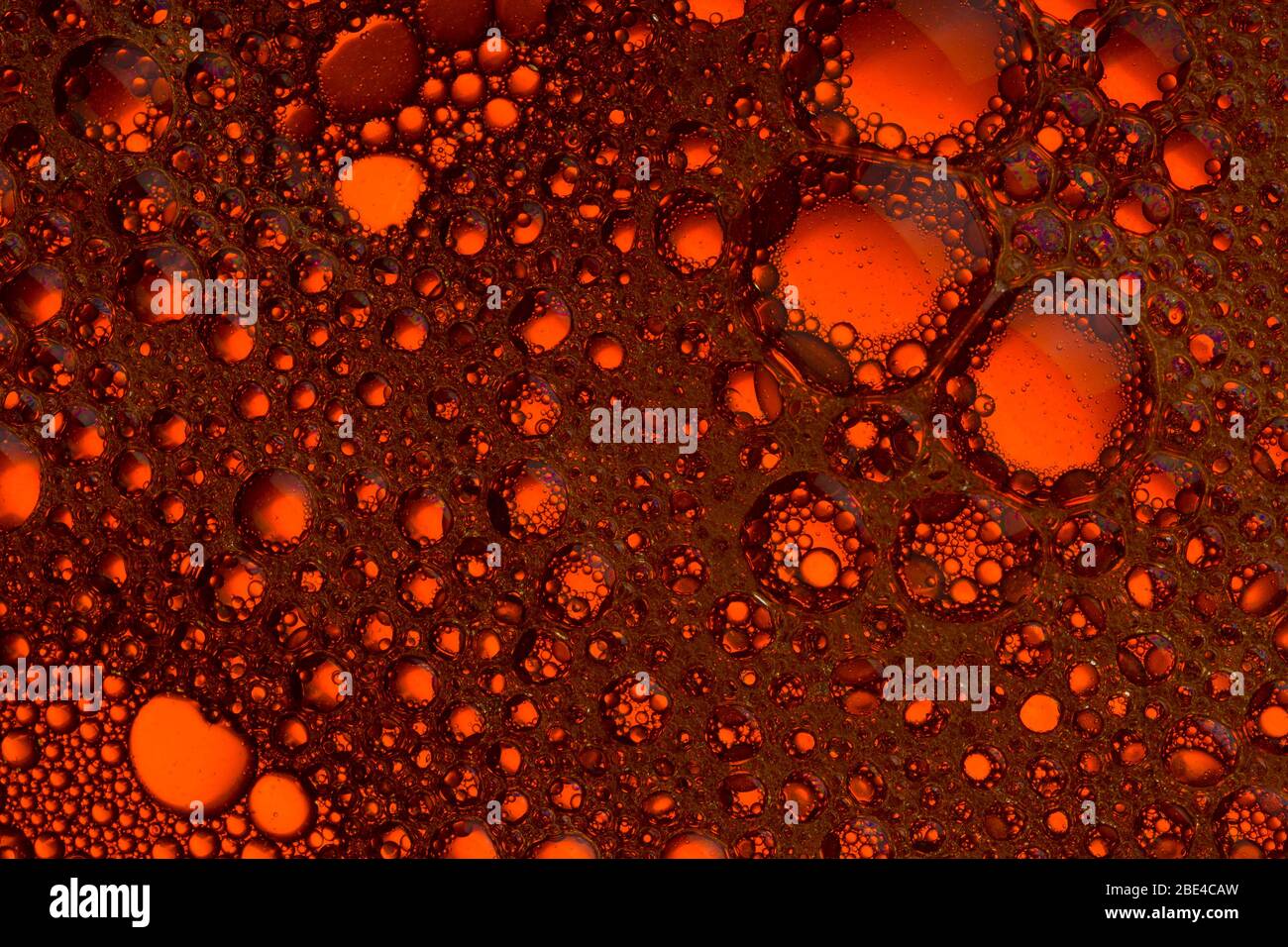 red orange water bubbles abstract background close up Stock Photo