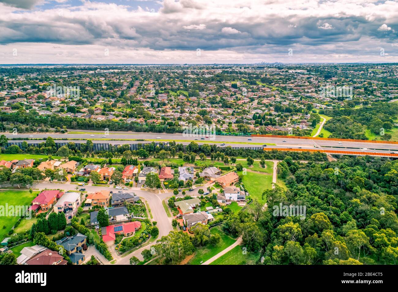 Aerial view of Eastlink tollway passing through suburbs in Melbourne, Australia Stock Photo