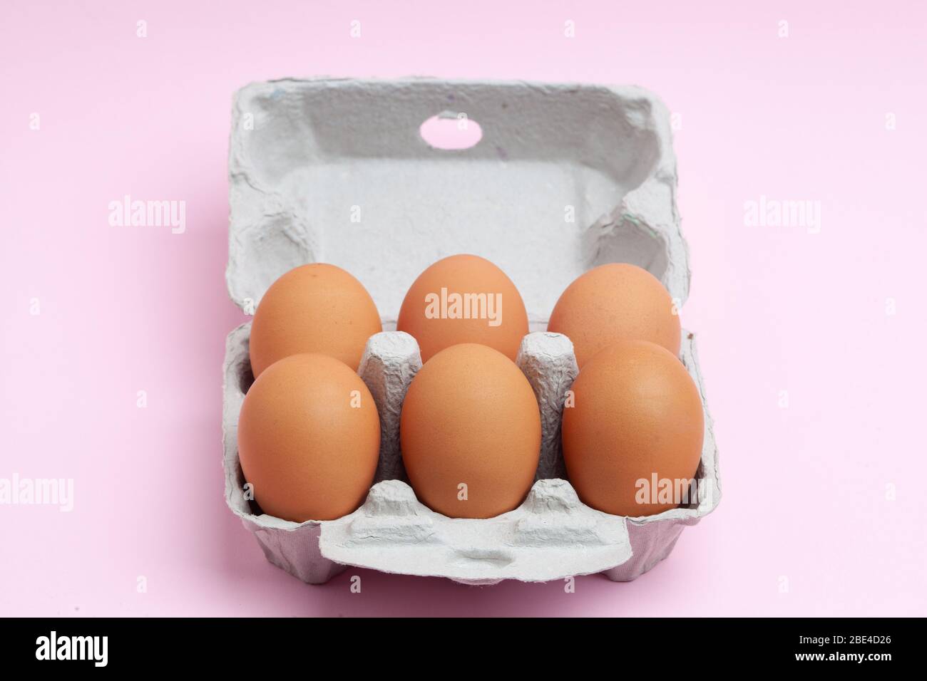Download Six Pack Of Eggs In Open Carton On Pink Background Stock Photo Alamy Yellowimages Mockups