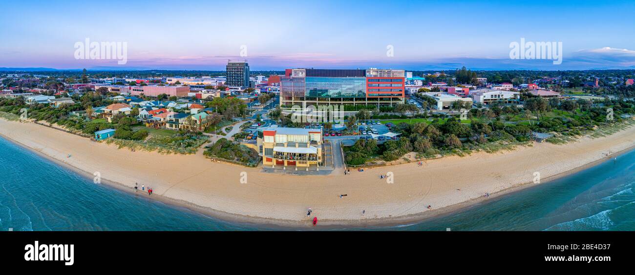 Wide aerial panorama of Frankston foreshore with the Waves restaurant and South East Water head office building at dusk. Melbourne, Victoria, Australi Stock Photo