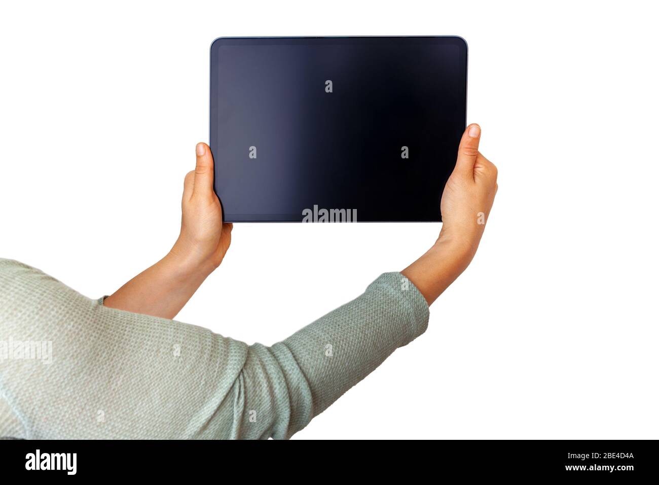 Woman hands holding tablet with copy space isolated on white background ...