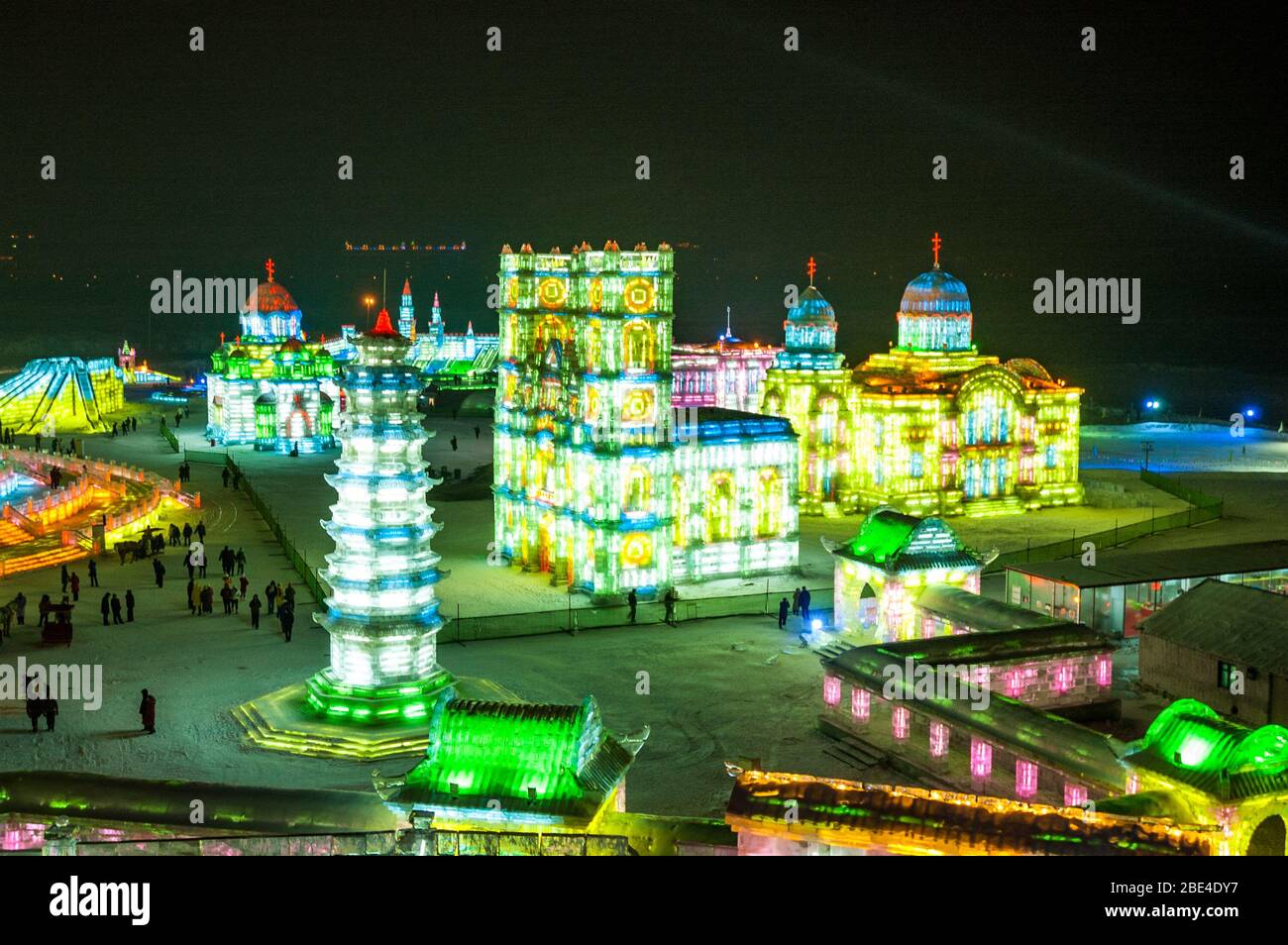 An overview of Snow & Ice World in Harbin showing ice sculptures of churches. Stock Photo