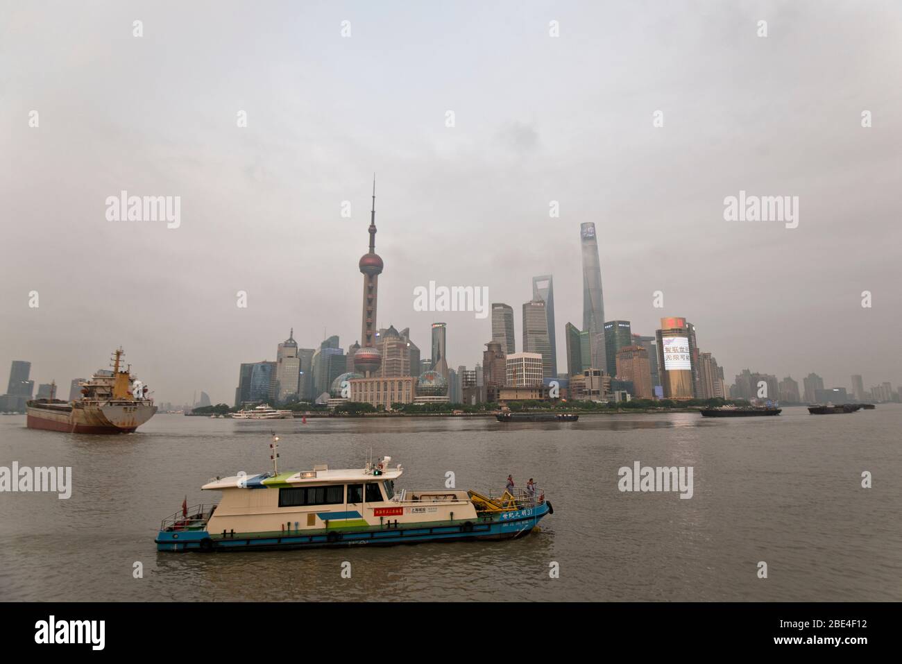 Shanghai's Pudong skyline towers over the Huangpu River, view from The Bund. China Stock Photo