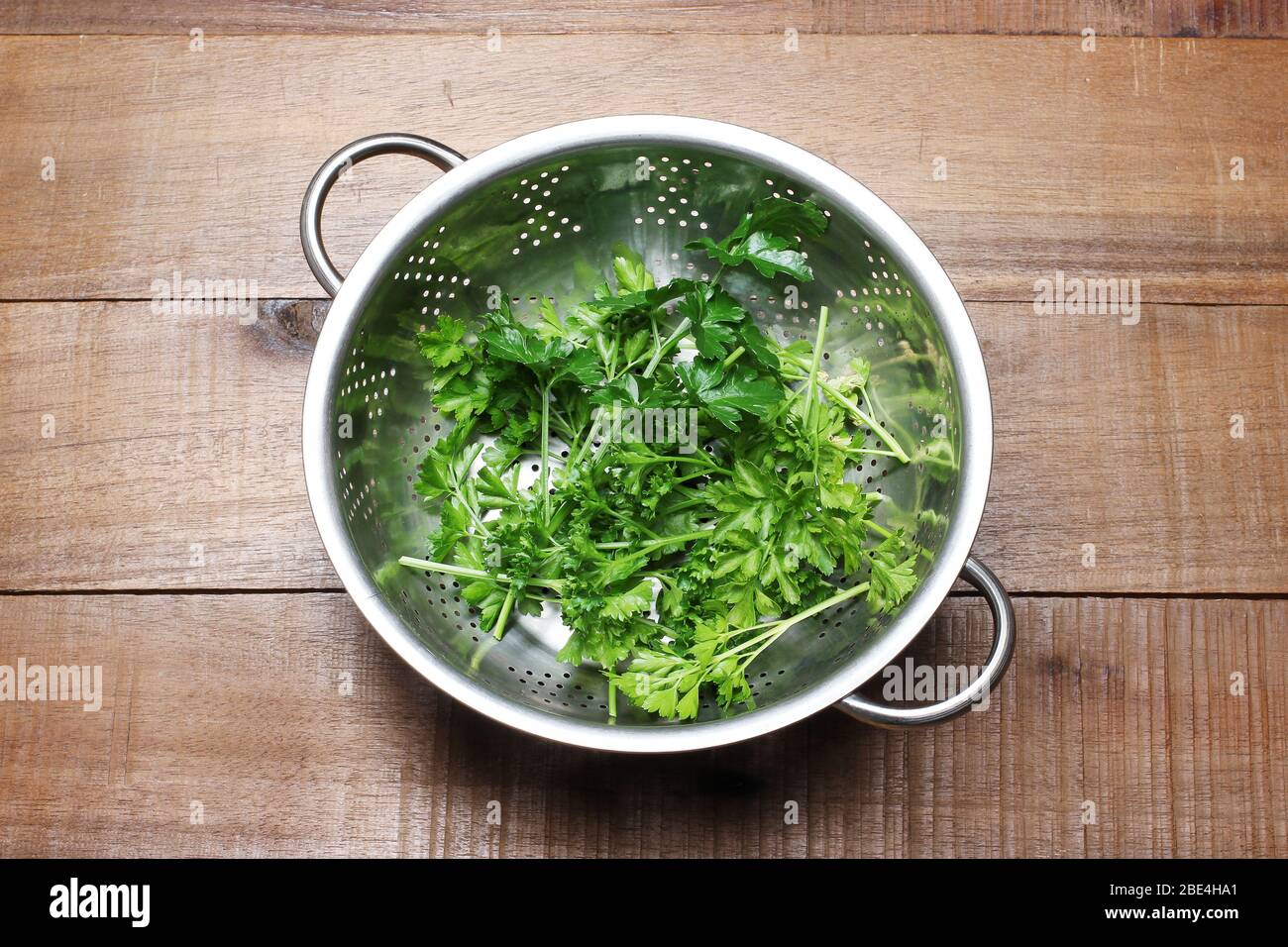 Parsley in Coriander on Wooden Background Stock Photo Alamy