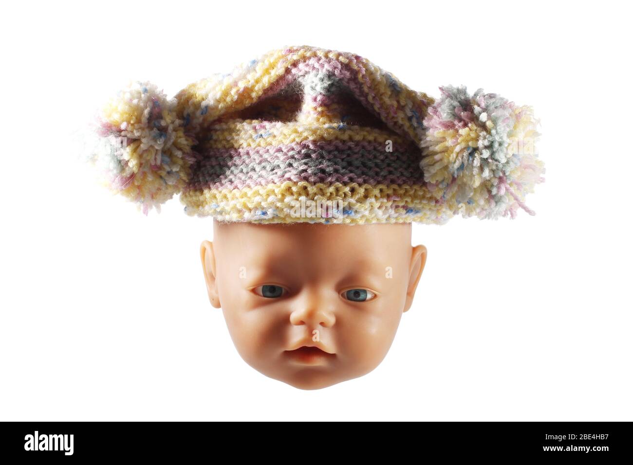 Baby Doll with Beanie on White Background Stock Photo