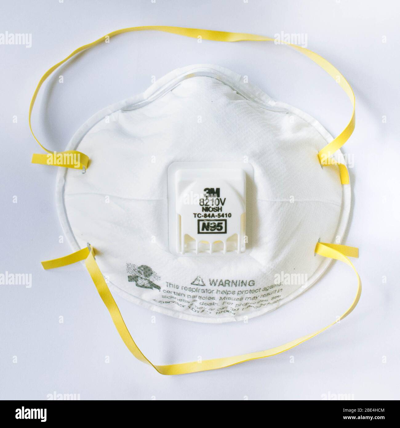 3M 8210 N95 respirator mask for coronavirus control. Isolated on white. Stock Photo