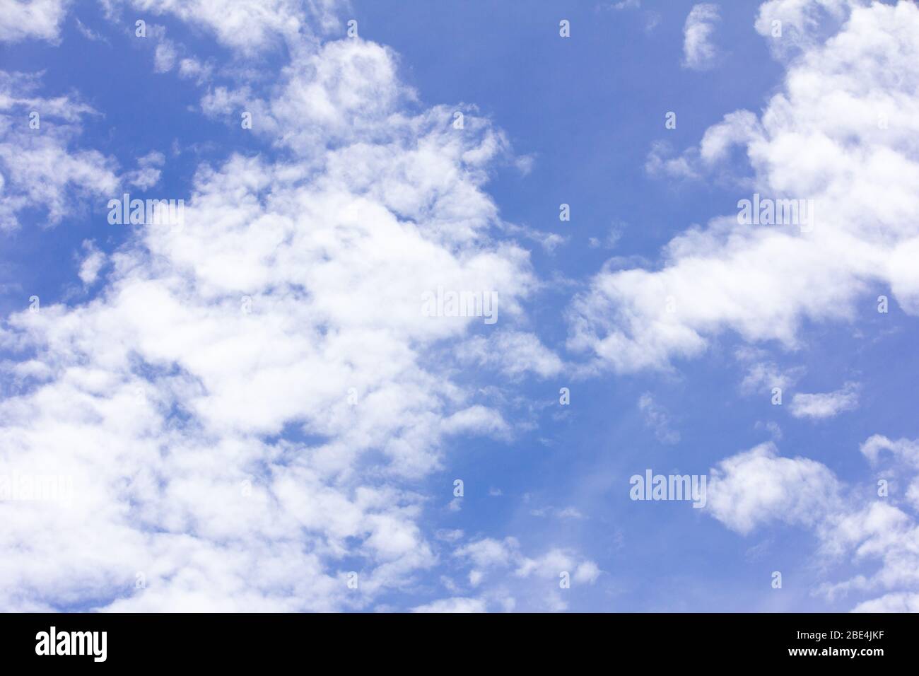 Clear blue color sky with white cloud background Stock Photo - Alamy