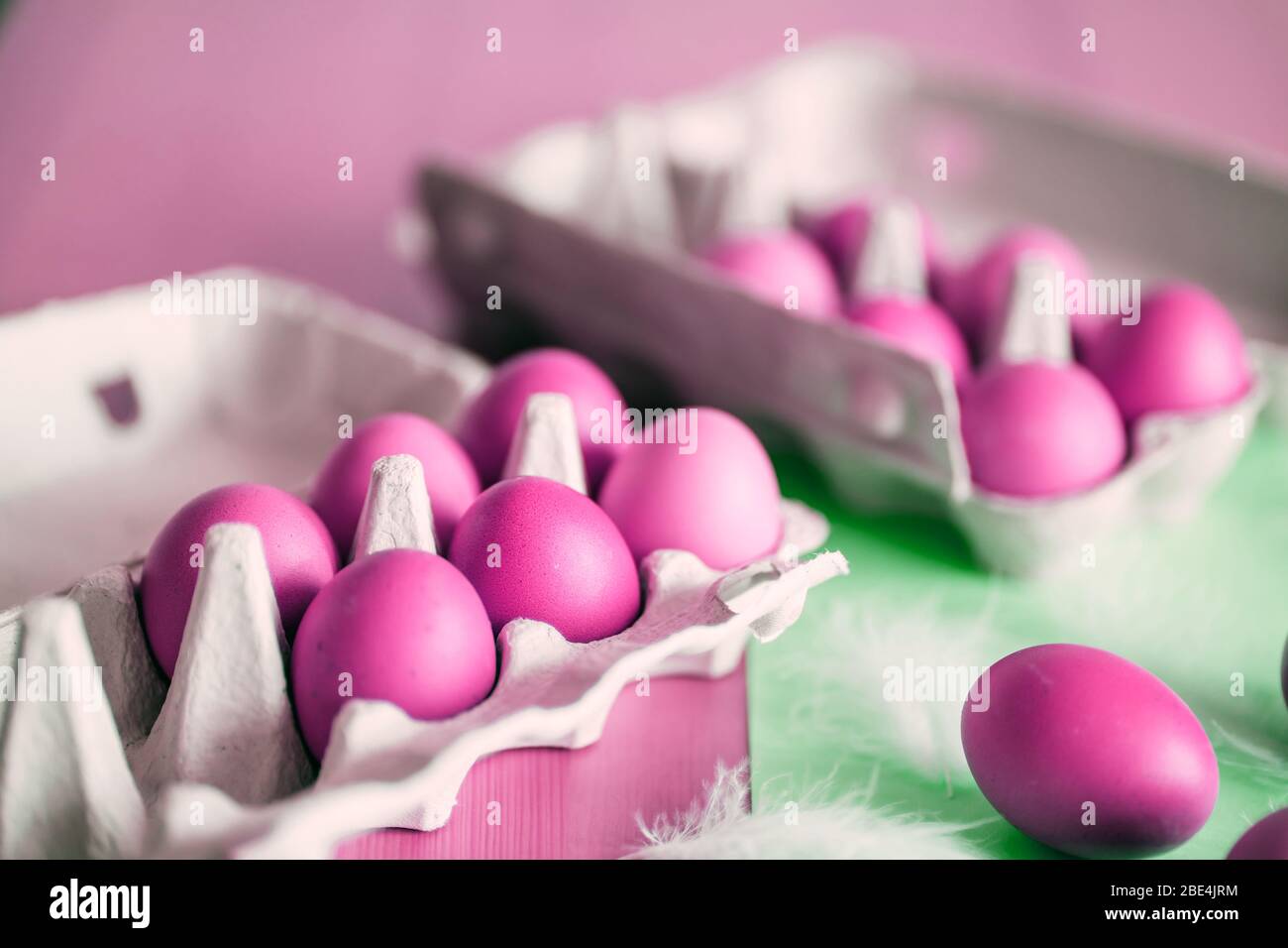 Closeup of beautiful pink eggs on a pastel background. Happy Easter, spring, holiday concept Stock Photo