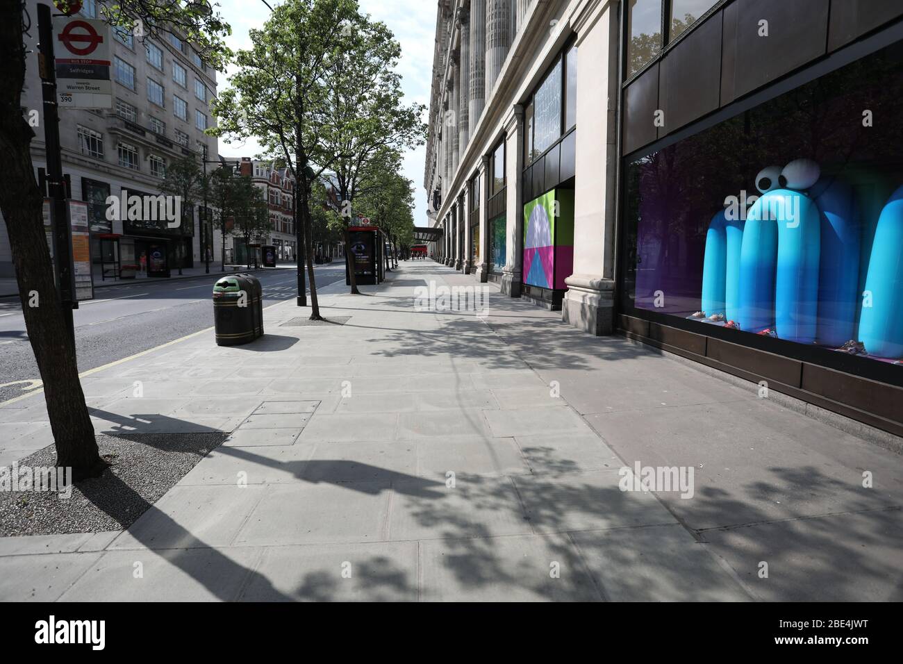 London, UK. 11th Apr, 2020. Day Nineteen of Lockdown in London. A very quiet Oxford Street, on Easter Saturday. It is the first public holiday of the year, and many people enjoy the long weekend by going out and about or on holiday, but this year the country is on lockdown due to the COVID-19 Coronavirus pandemic. People are not allowed to leave home except for minimal food shopping, medical treatment, exercise - once a day, and essential work. COVID-19 Coronavirus lockdown, London, UK, on April 11, 2020 Credit: Paul Marriott/Alamy Live News Stock Photo