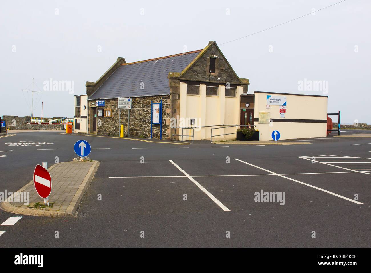 11 April 2020 The stone built Boathouse and Harbour Office at Groomsport Harbour in County Down Northern Ireland shut up during the Covid 19 lockdown Stock Photo