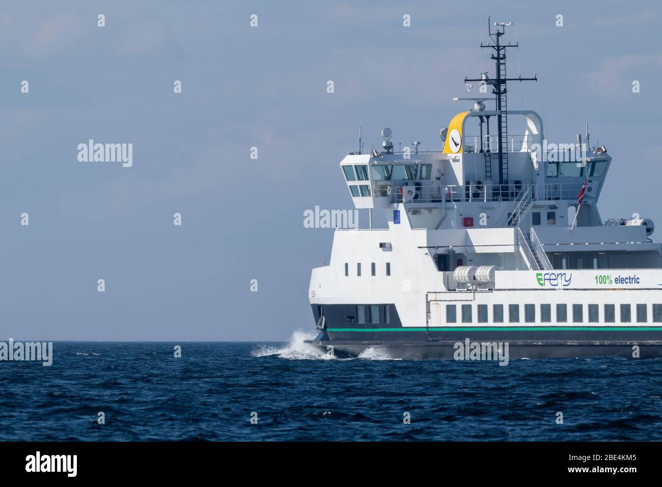 The 100 percent electric propelled domestic car and passenger ferry ELLEN passes Skjoldnæs on the northernmost tip of the Danish island Ærø. Stock Photo