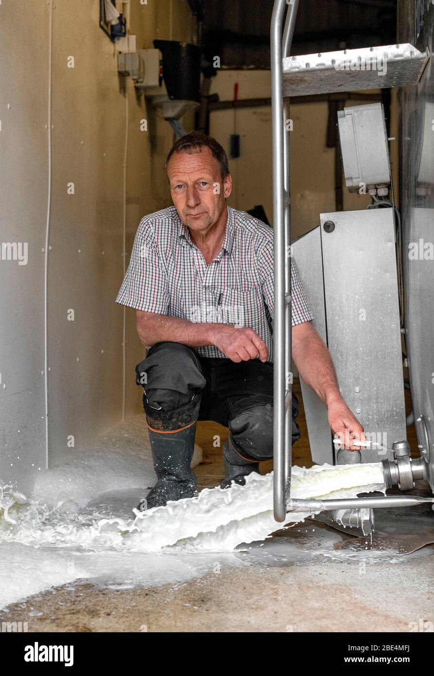 Wiltshire dairy farmer Robert Mallett who is having to throw away thousands of litres of fresh