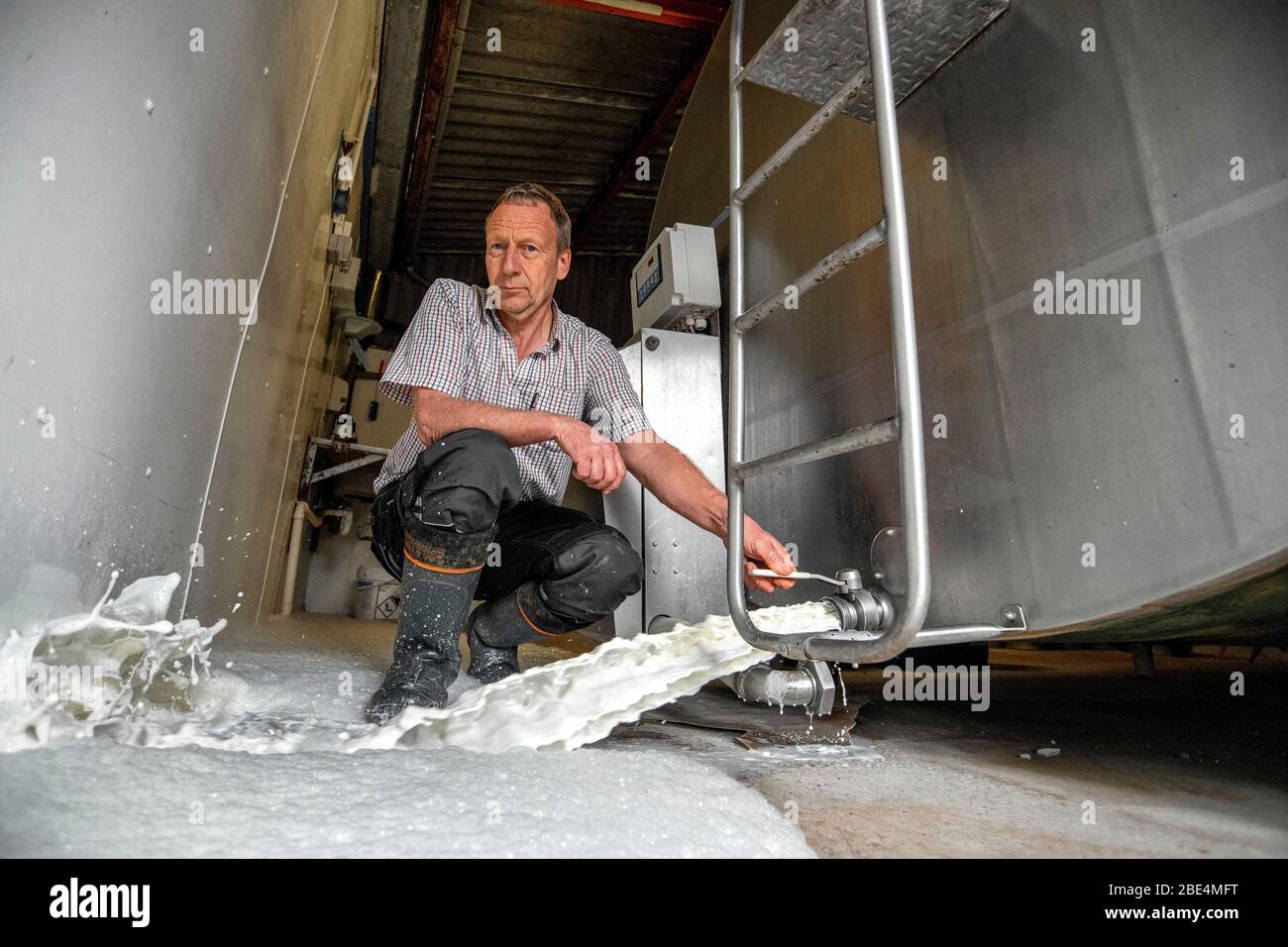 Wiltshire dairy farmer Robert Mallett who is having to throw away thousands of litres of fresh