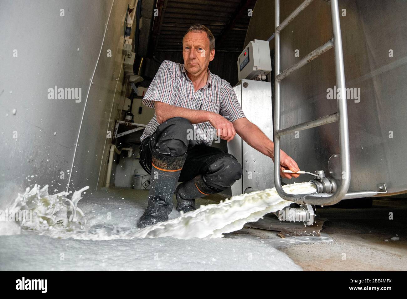 Wiltshire dairy farmer Robert Mallett who is having to throw away thousands of litres of fresh