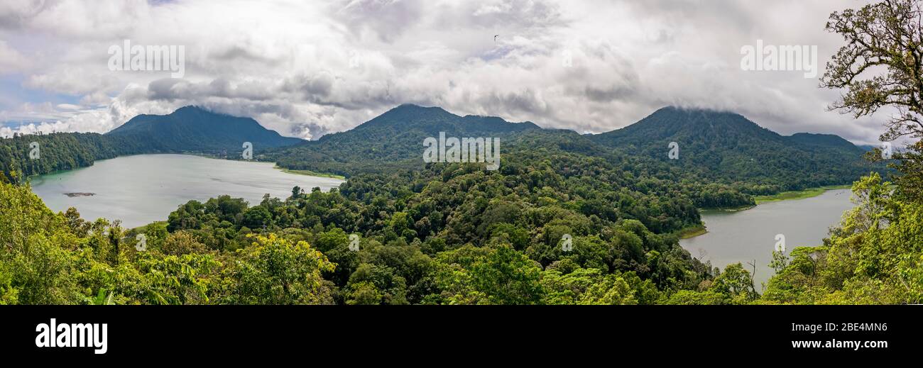 Horizontal panoramic of the twin lakes, Buyan and Tamblingan in Bali, Indonesia. Stock Photo