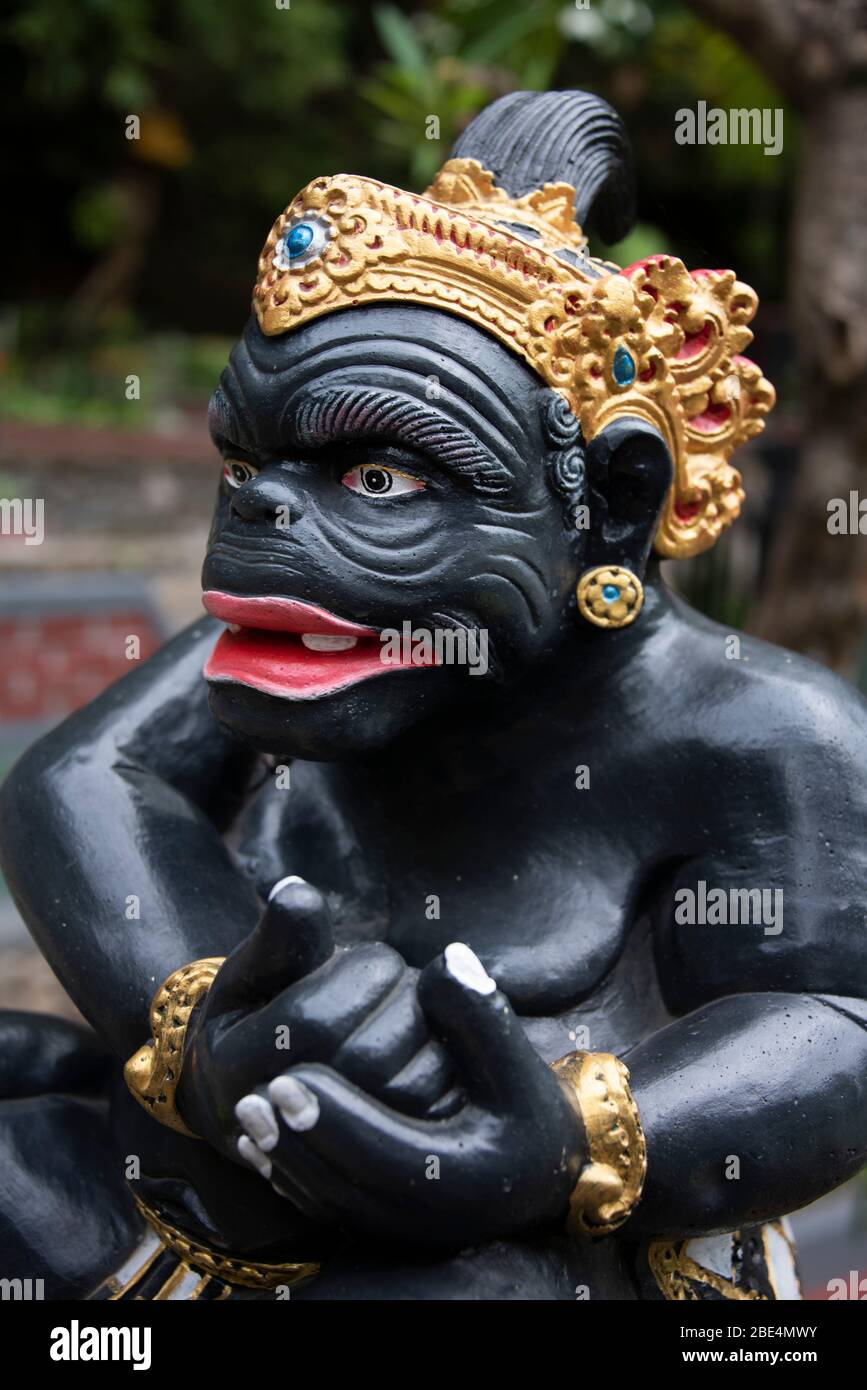 Vertical close up of a Tualen statue in Bali, Indonesia. Stock Photo