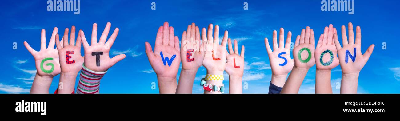 Children Hands Building Word Get Well Soon, Blue Sky Stock Photo