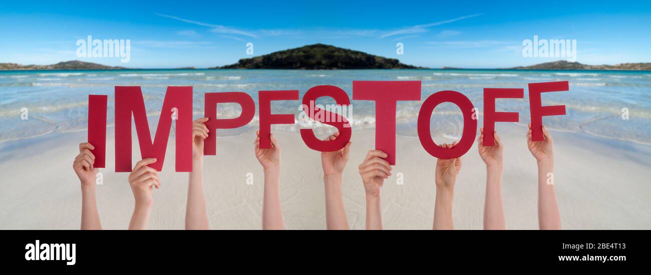 People Hands Holding Word Impfstoff Means Vaccine, Ocean Background Stock Photo