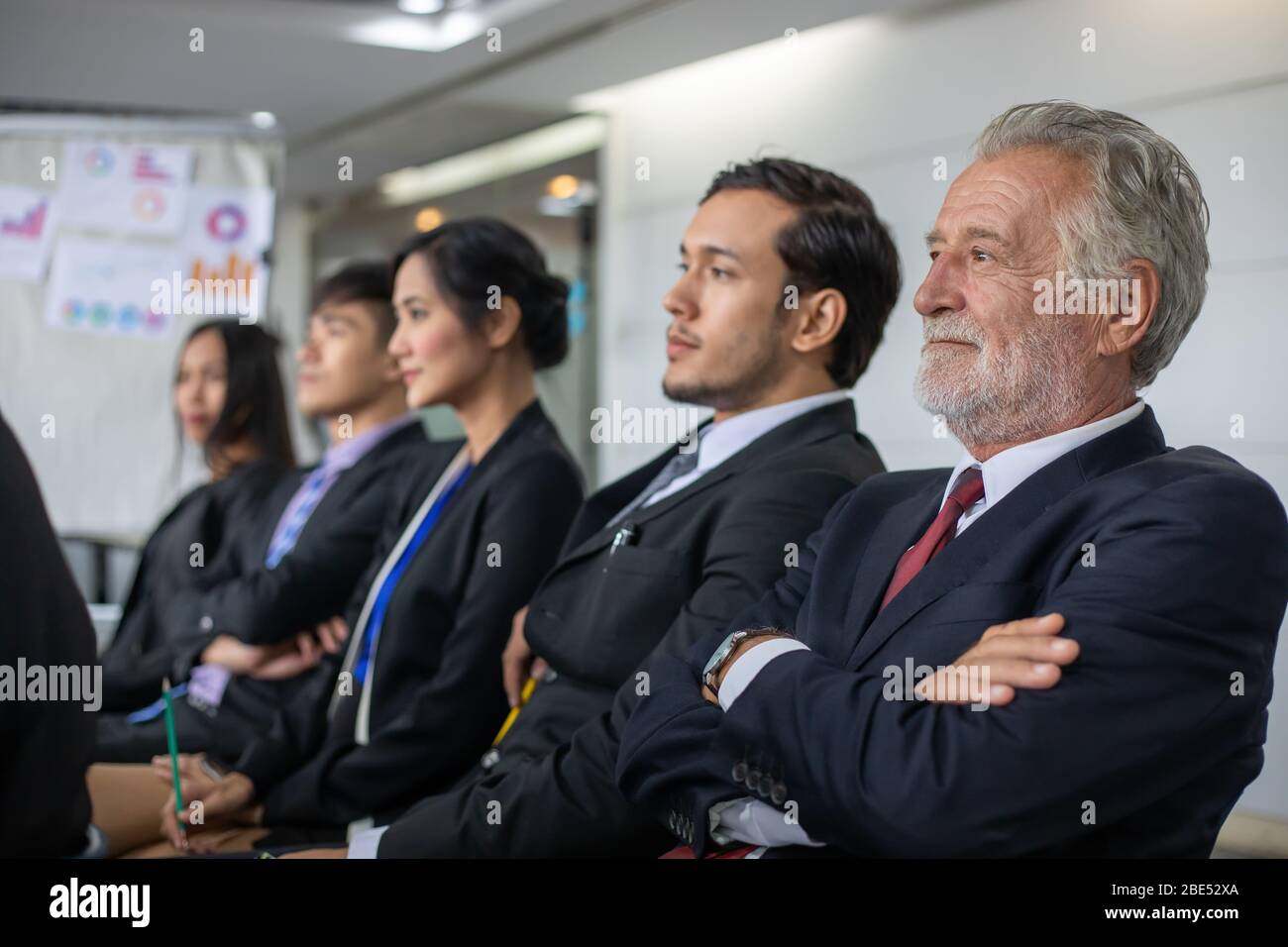 Business people sit and listen to the seminar in the meeting room Stock Photo