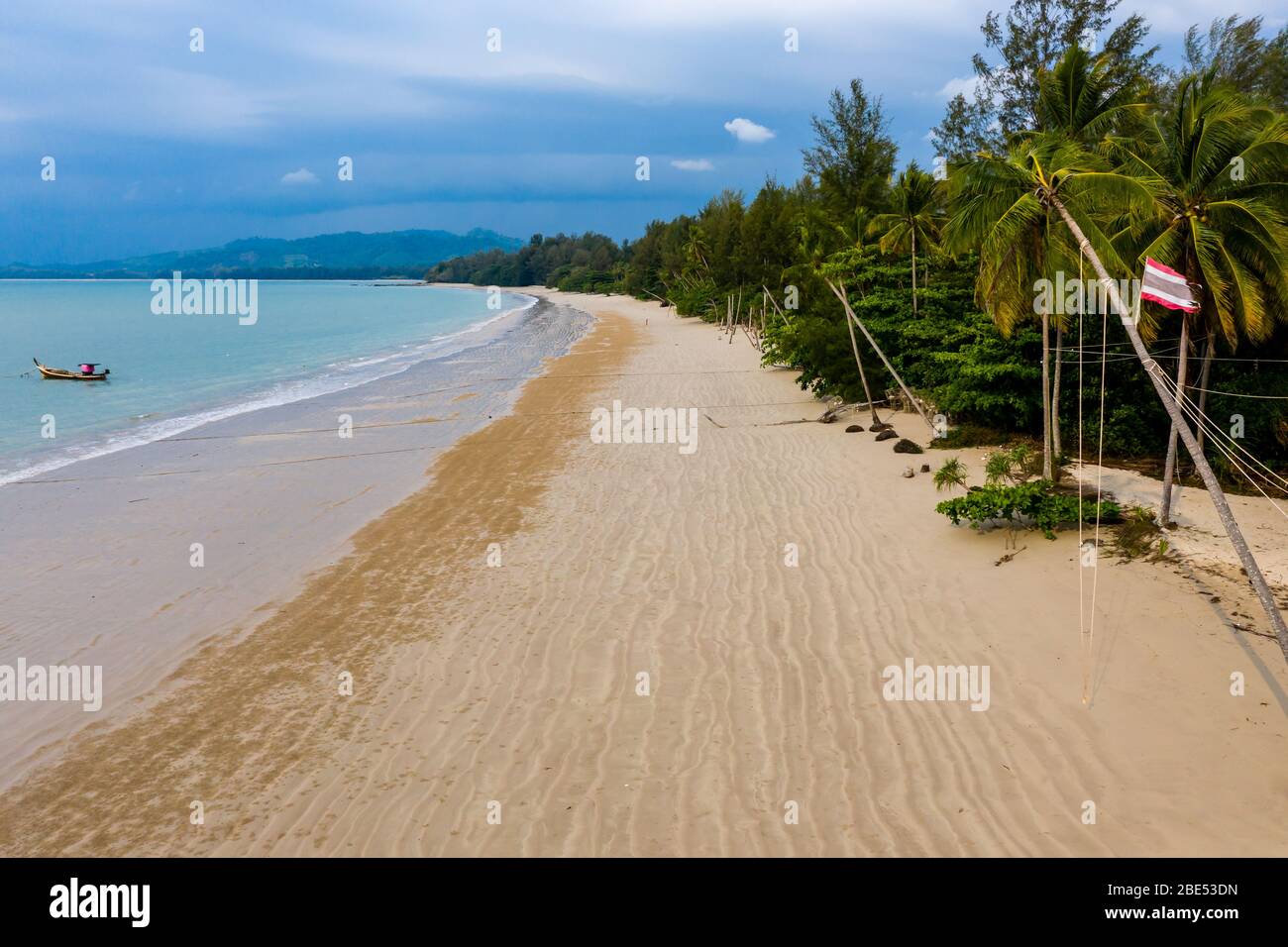 Aerial drone view of a totally deserted tropical beach in Thailand during the Coronavirus lockdown Stock Photo