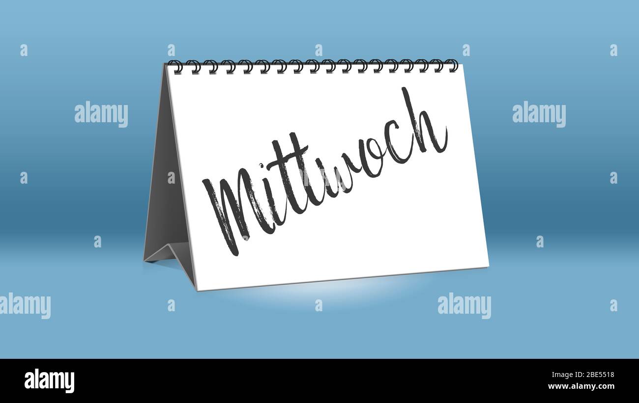 A calendar for the desk shows the day of the week Wednesday (Mittwoch in German language) | Ein Kalender für den Schreibtisch zeigt den Wochentag Mitt Stock Photo