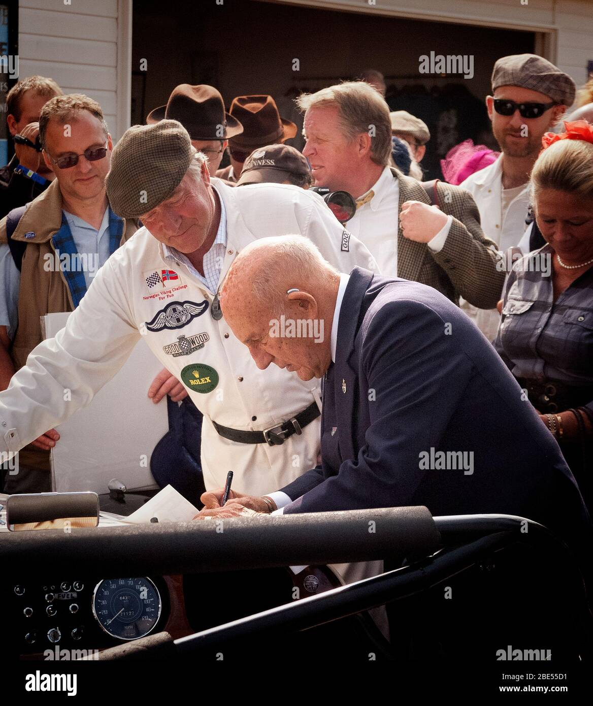 Sterling Moss surrounded by fans at Goodwood Revival on 21 September 2009.  His death was announced on 12 April 2020. Stock Photo