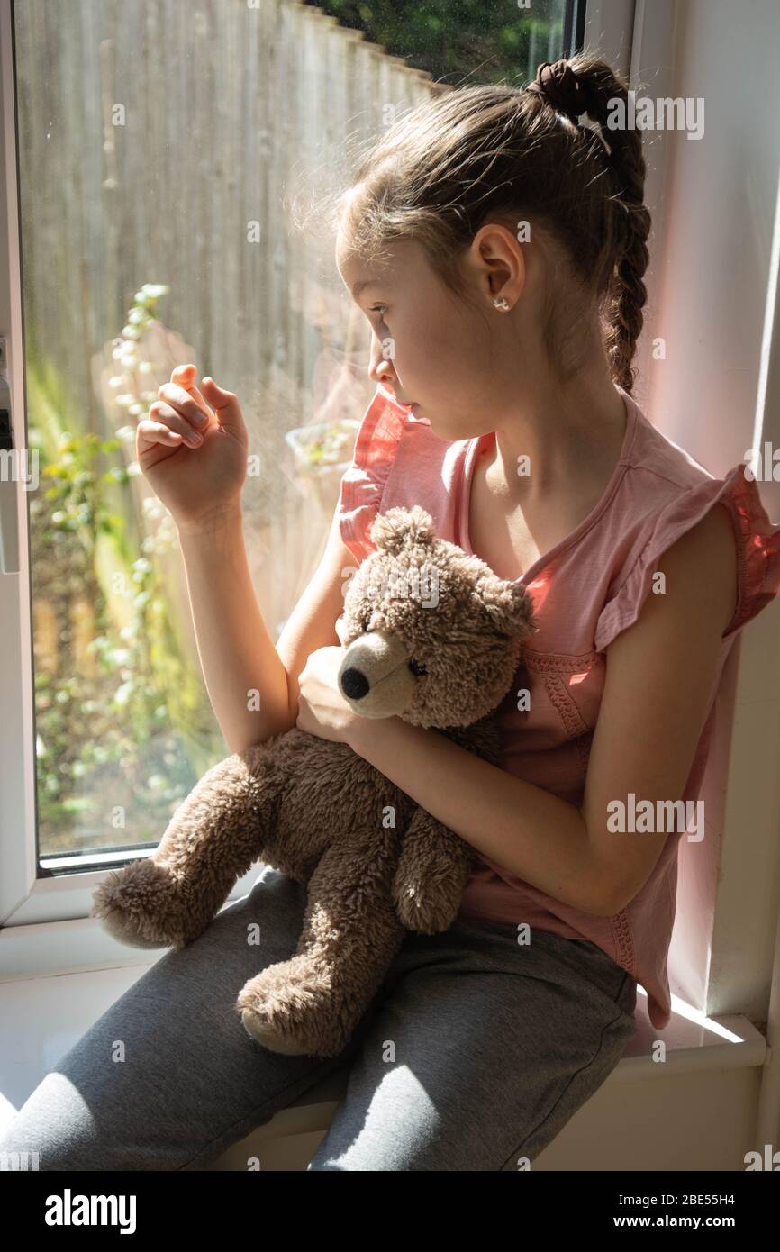 sad teddy bear with girl