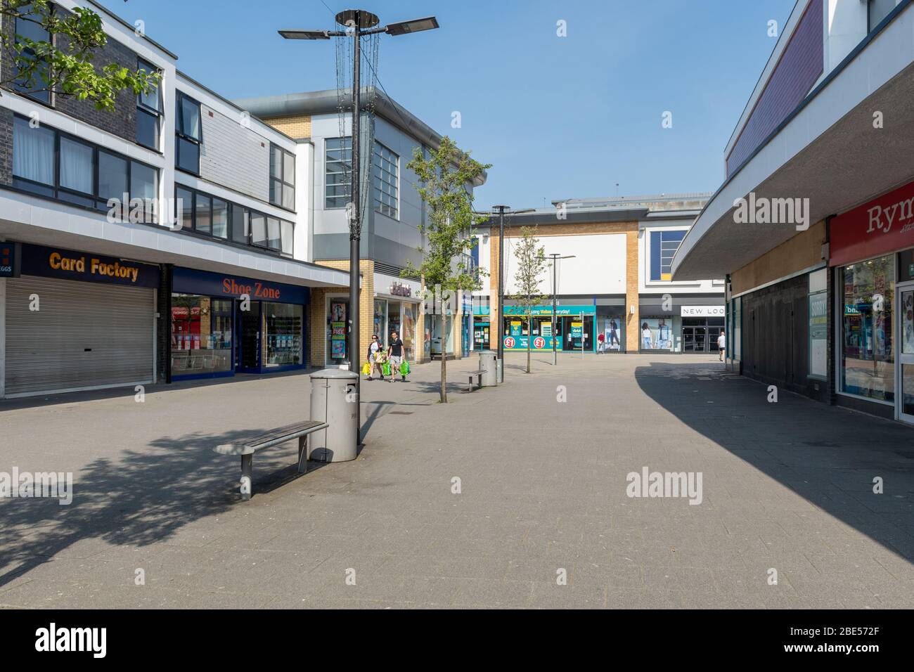 10 April 2020. During the 2020 coronavirus Covid-19 pandemic, a lockdown is in place in the UK, and people are only allowing to go out for specific reasons. Non-essential businesses and shops are shut. In Farnborough town centre, Hampshire, many shops are closed with the shutters down, and it is much more empty then usual with very few people around. Stock Photo