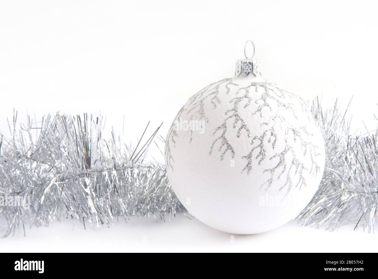 Christmas tree decorations balls and silver tinsel Stock Photo Alamy