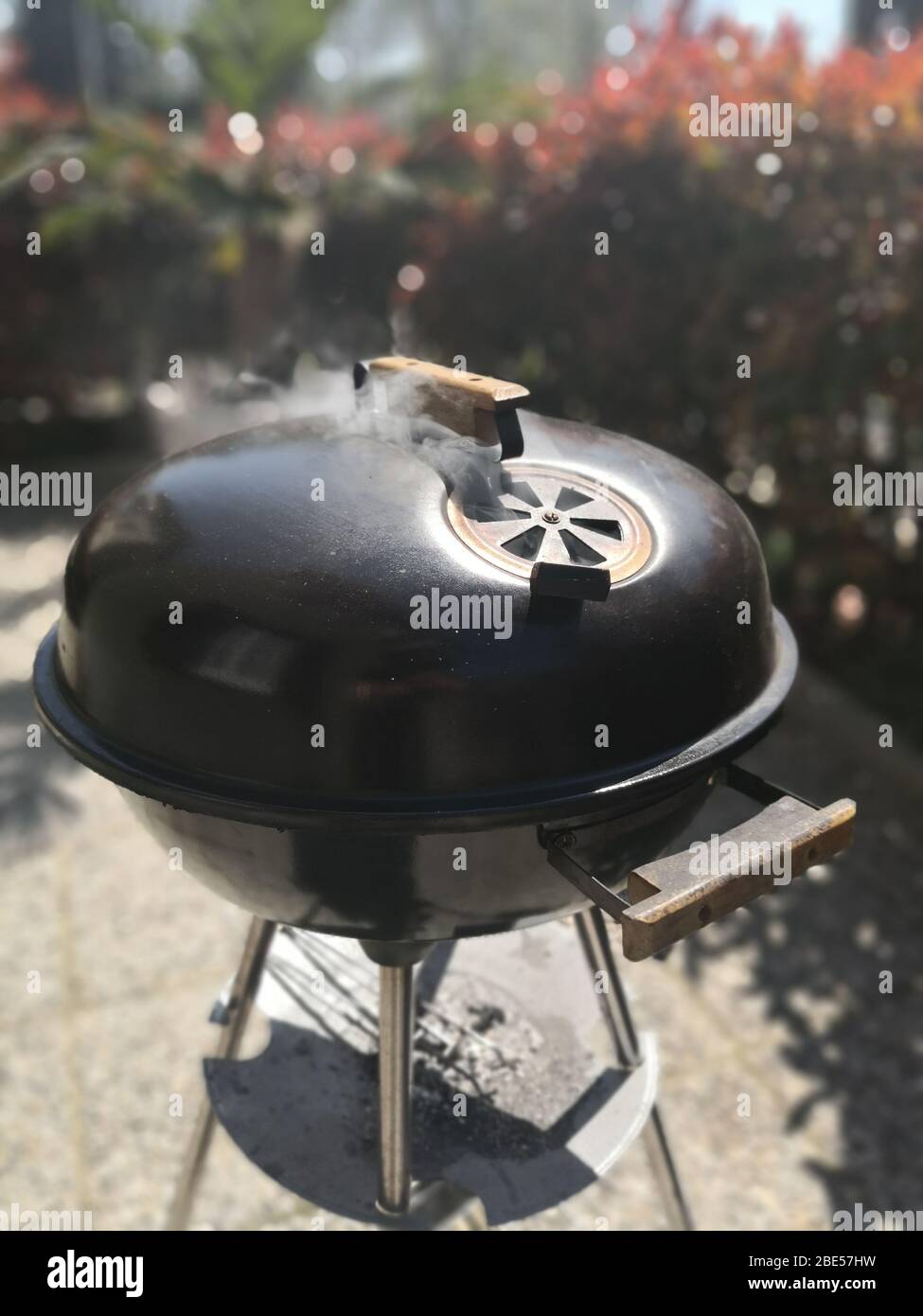 A barbeque in action Stock Photo