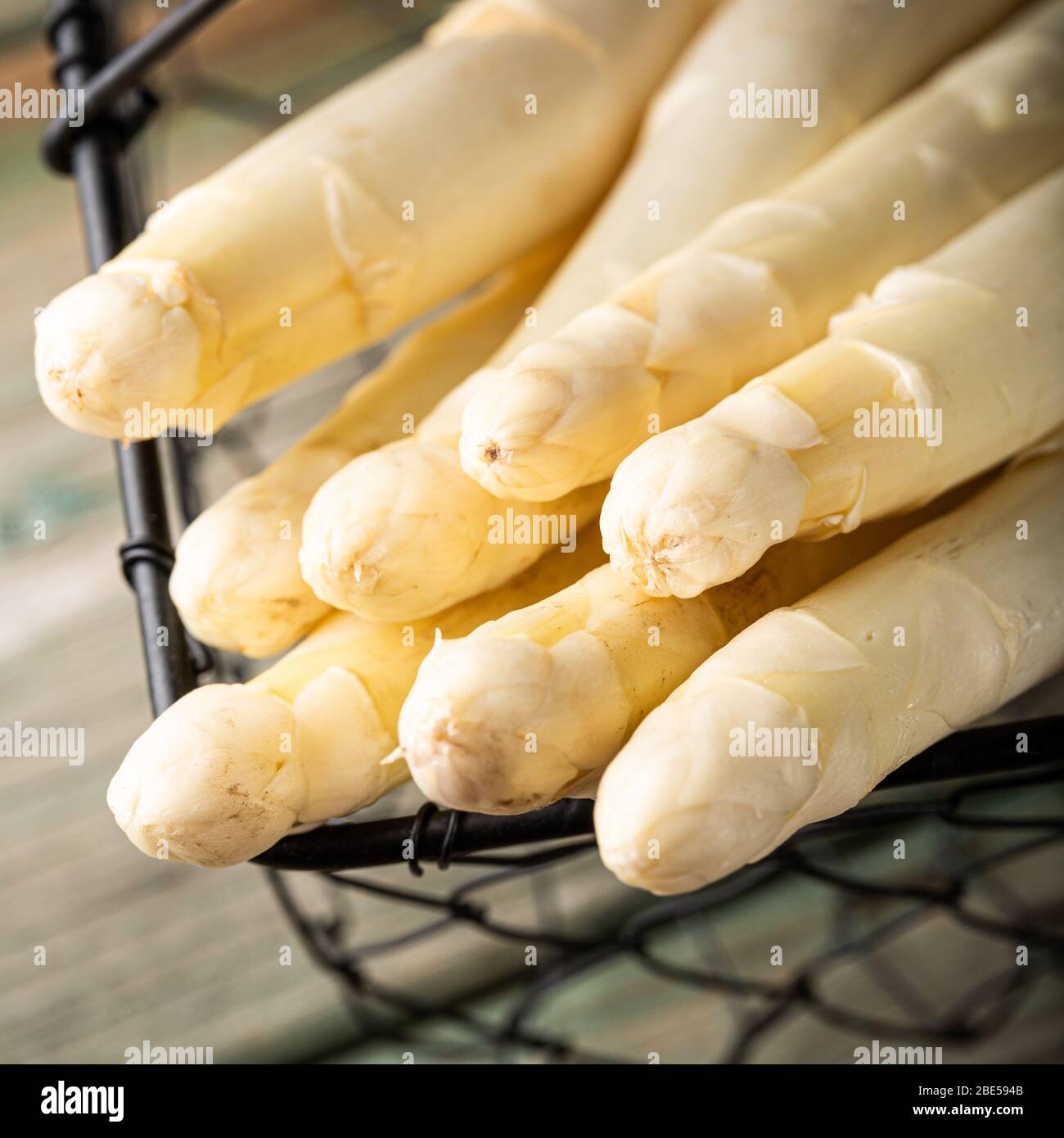 White asparagus on wooden table Stock Photo