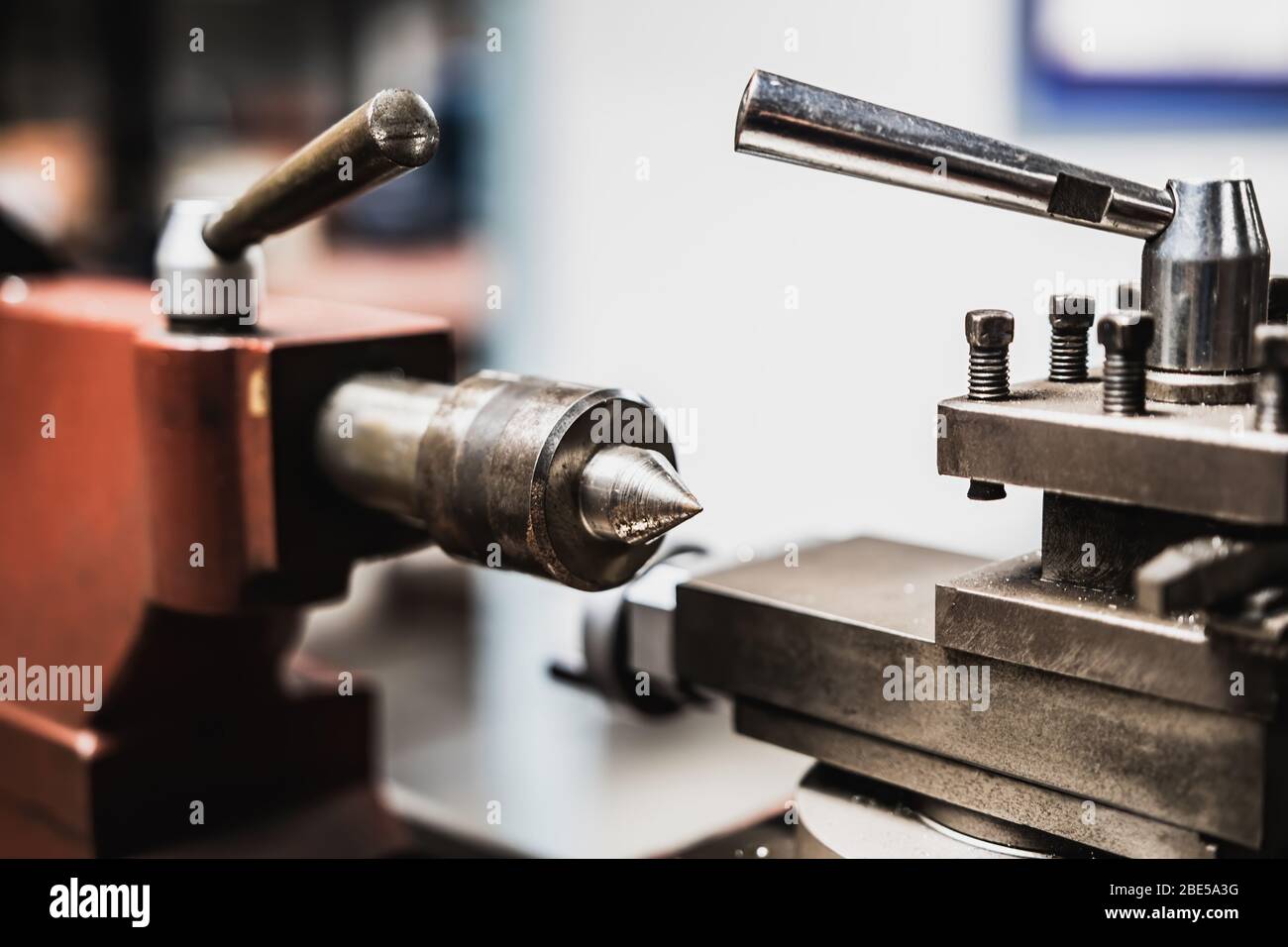 Metal lathe machine close up shot with blurred background Stock Photo ...