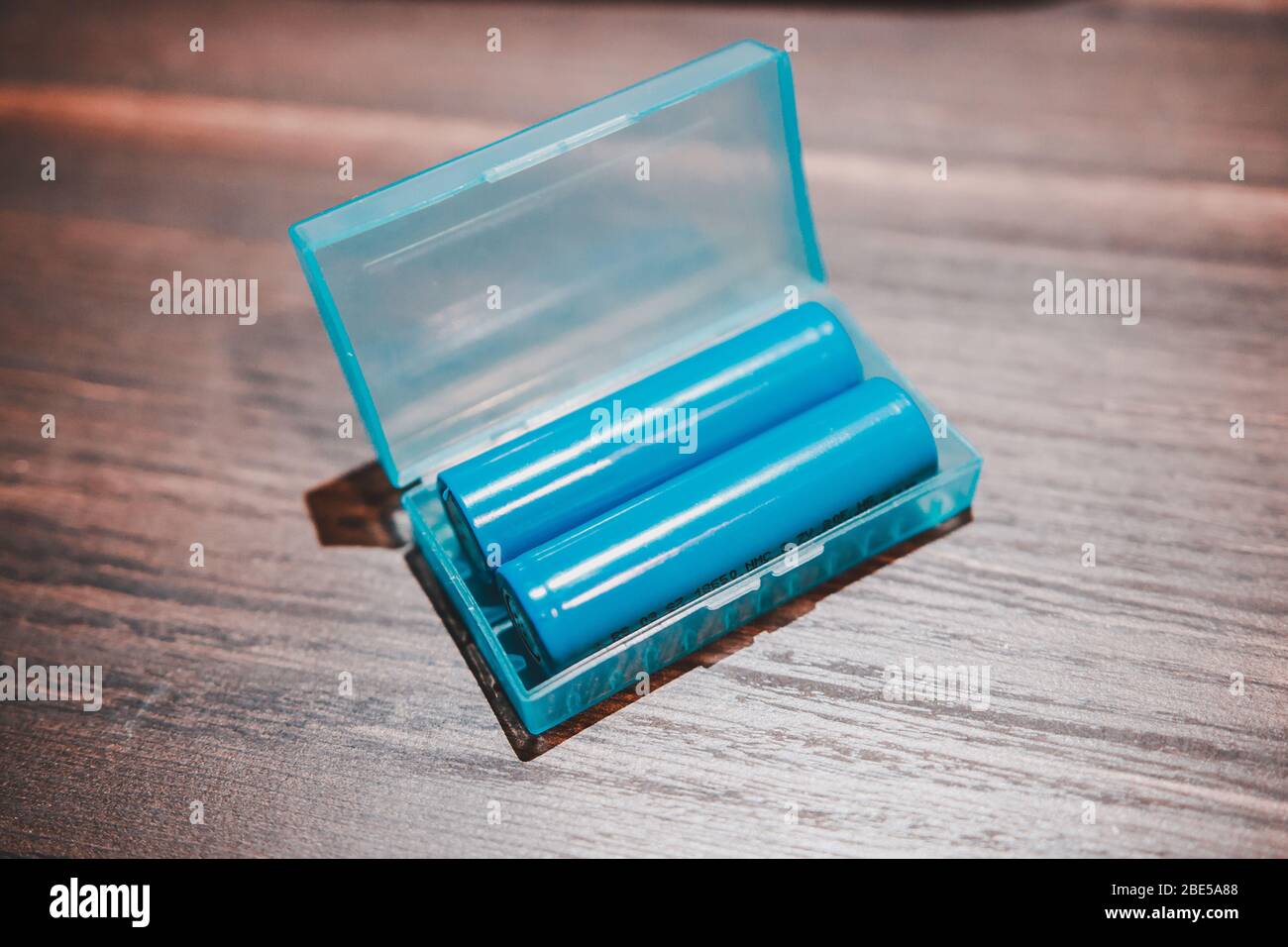 Blue 18650 Lithium Ion Battery cell inside a plastic container, known for  use with vape or e cigarette. Also used to make laptop battery and power  ban Stock Photo - Alamy
