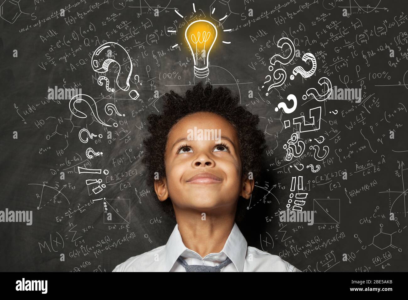 Think Smartly Smart black kid with lightbulb. Brainstorming and idea concept. Little ...