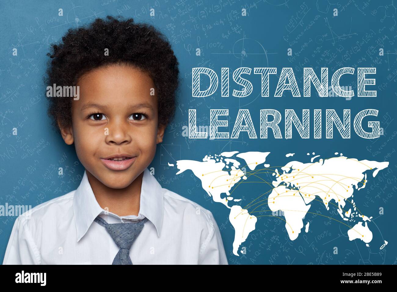 Happy smart African American child boy on blue background Stock Photo ...