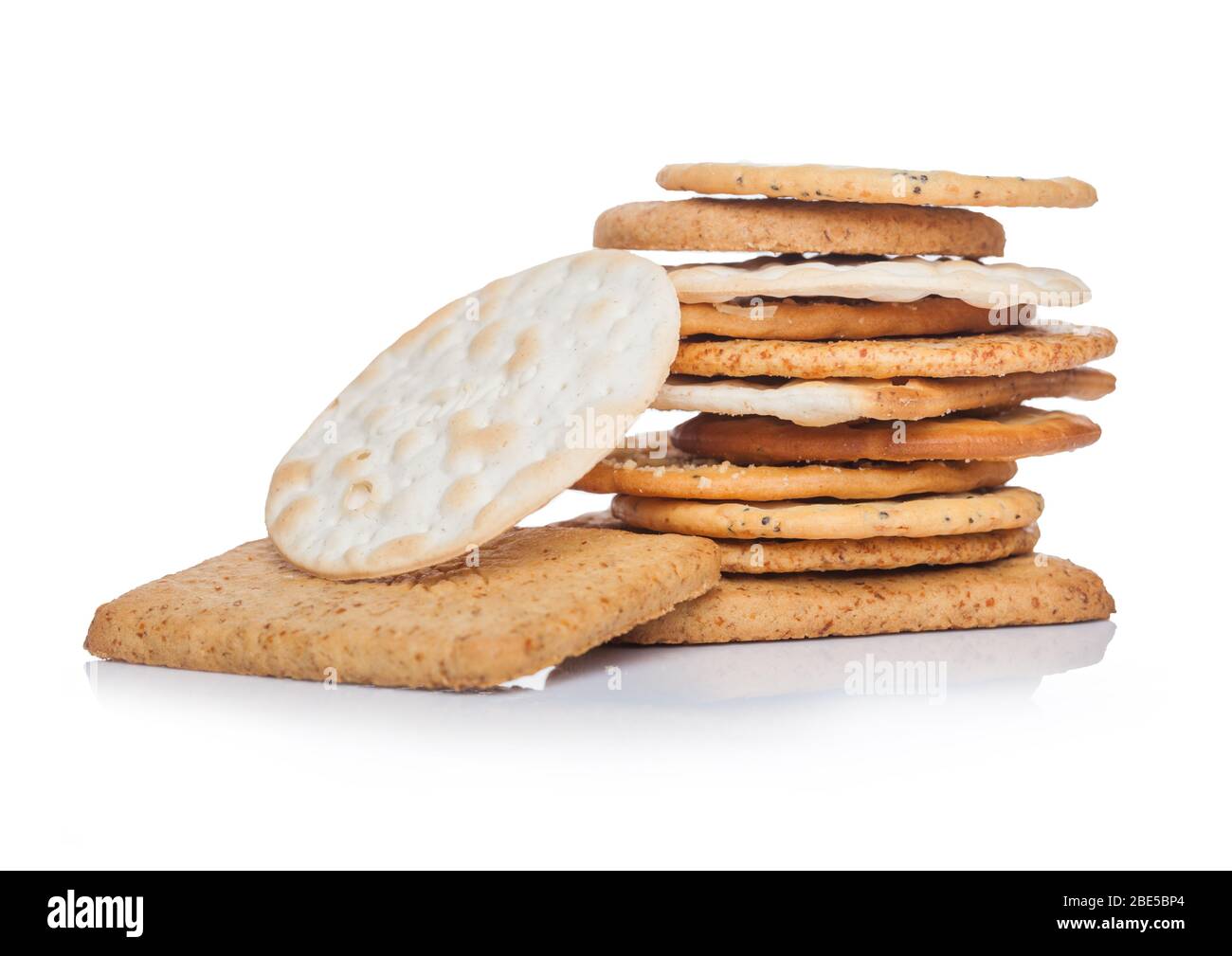 Stack of various organic crispy wheat, rye and corn flatbread crackers