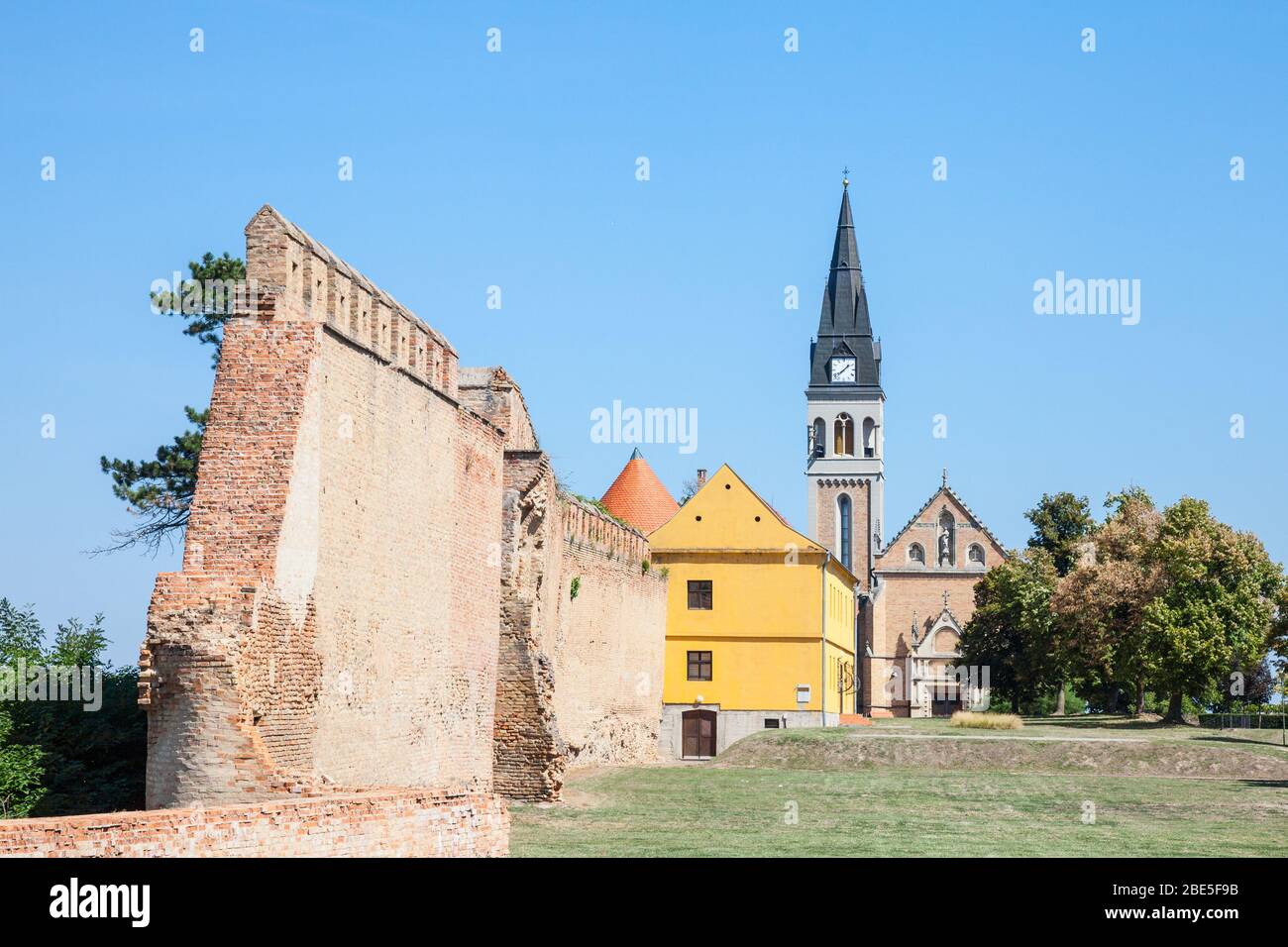 Ilok Church with its tower, the Sveti Ivan Kapistran church, in the franjevacki samostan convent. Ilok is the easternmost city of Croatia, in the slav Stock Photo