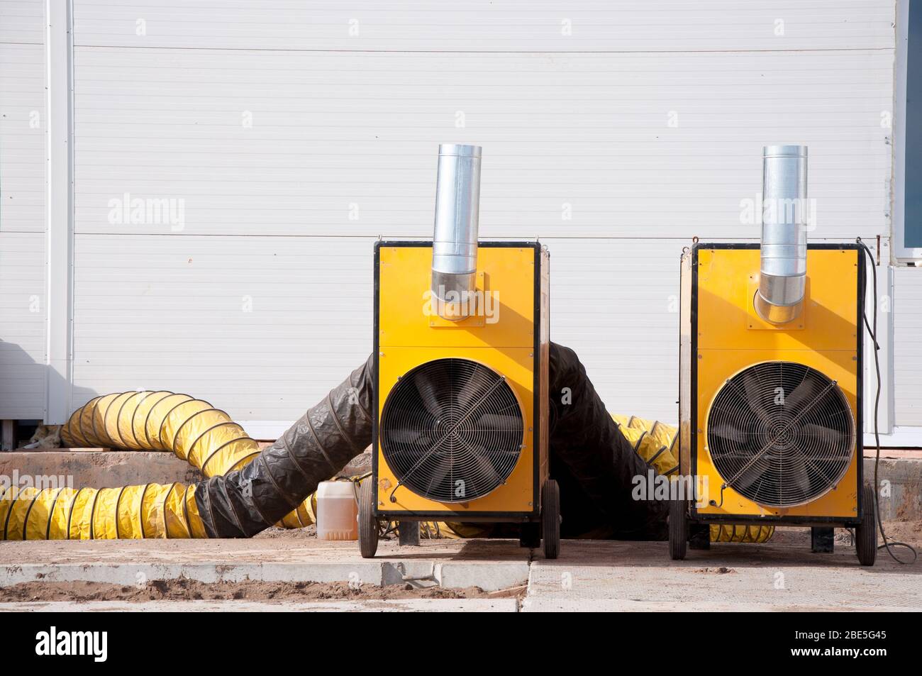 Large diesel heaters at a construction site. Equipment for heating a