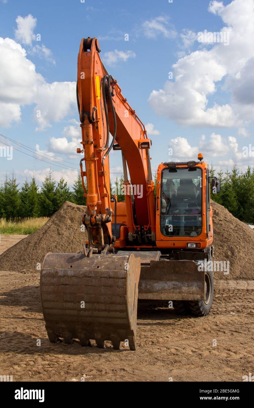 Bucket wheeled excavator hires stock photography and images Alamy