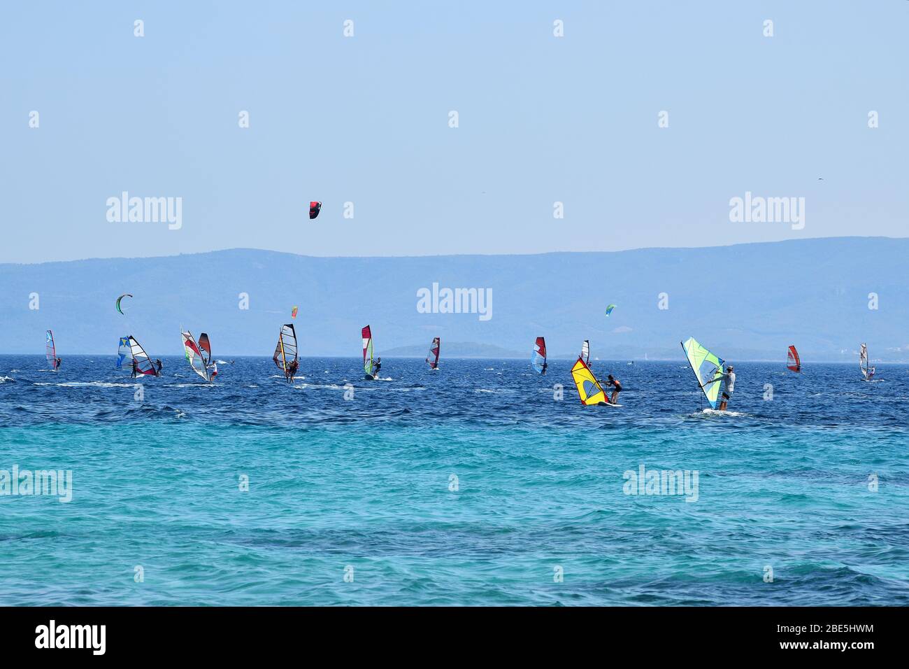 People are having an active pastime on vacation. Surfing on an Adriatic sea in Croatia. Stock Photo