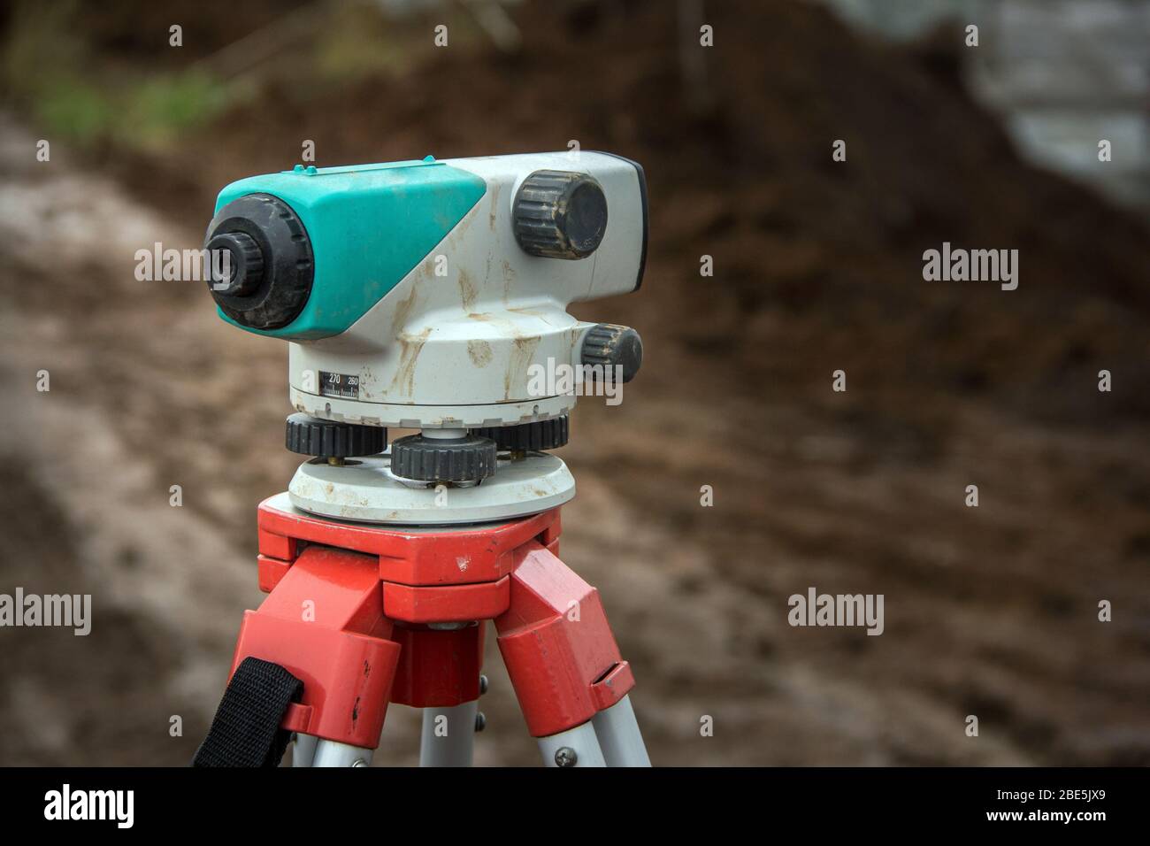 Surveying measuring equipment level theodolite on tripod. Construction