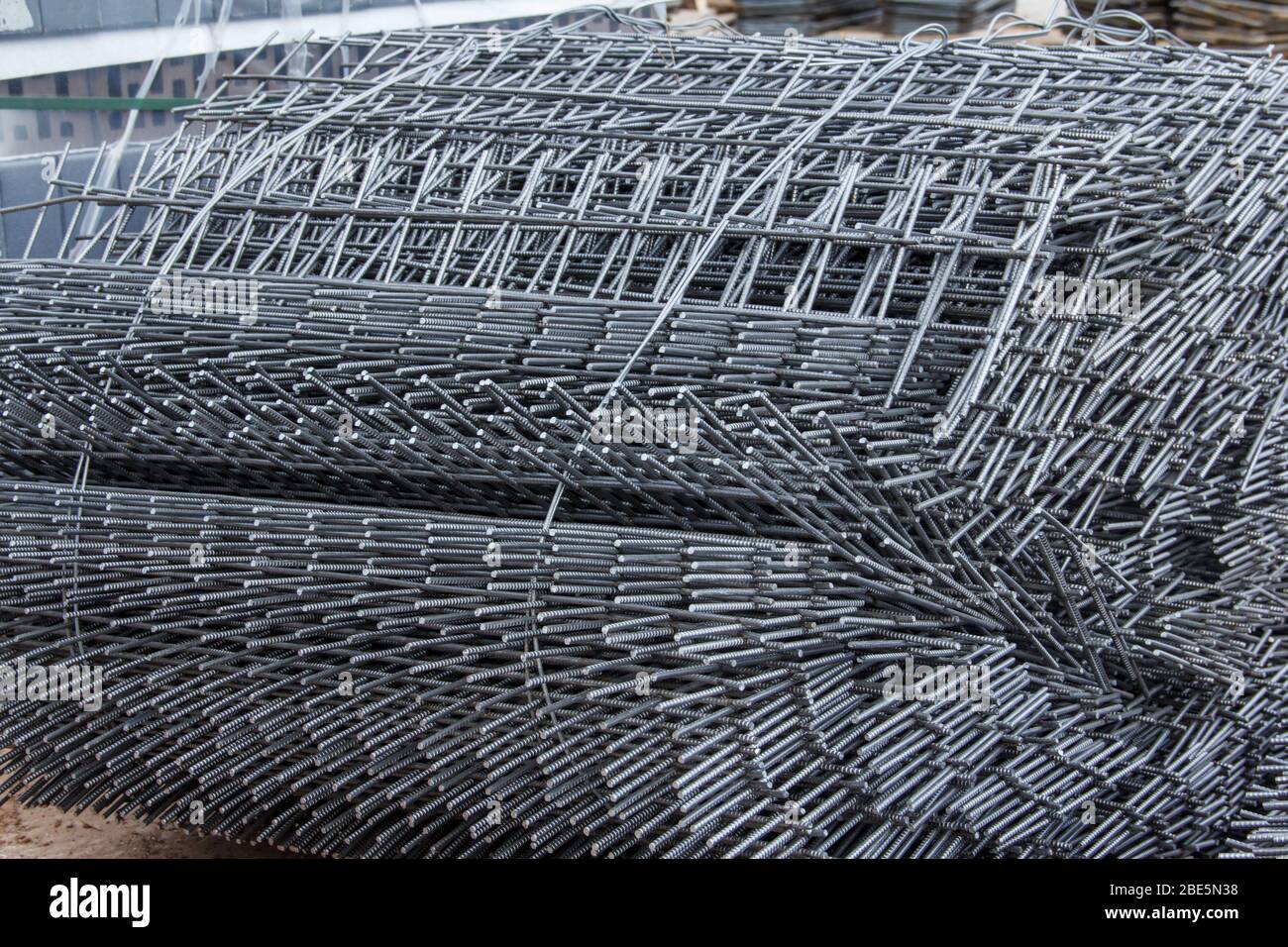 Reinforcing steel bars for building new concrete structures. Base for pouring concrete. Concrete construction. Stock Photo