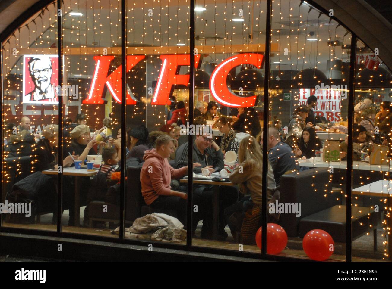 Moscow, RUSSIA - December 19, 2018: Families have dinner at the KFC restaurant in Moscow near the Kremlin. Stock Photo