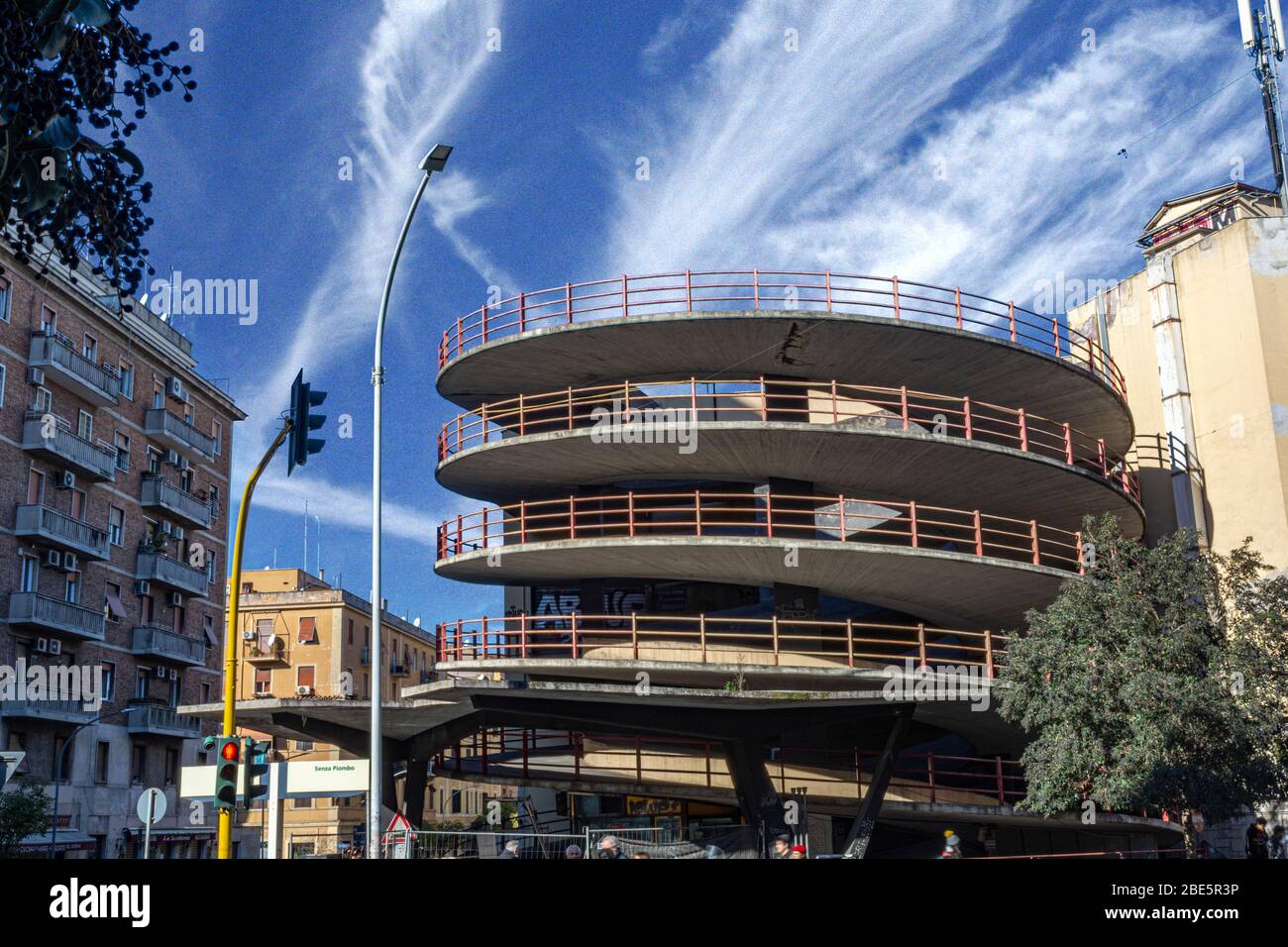 Rome, Italy, 25.12.2019: multi-level car parking in the city centre, parking in the center of Rome, blue cloudy sky Stock Photo