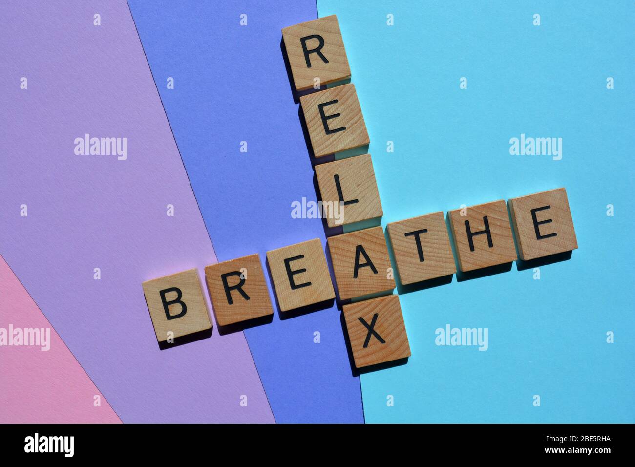 Breathe and Relax words in crossword form on colourful background